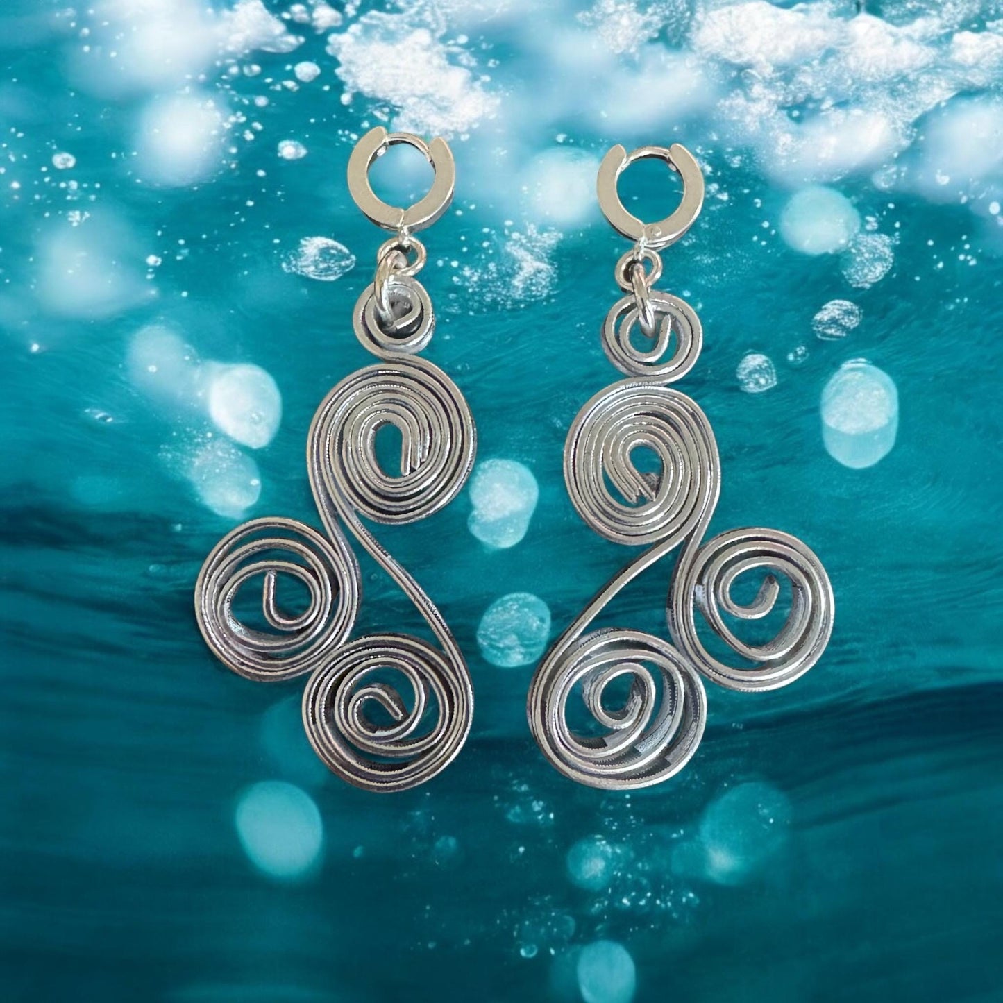 Rhythm in Silver” Spiral Statement Earrings